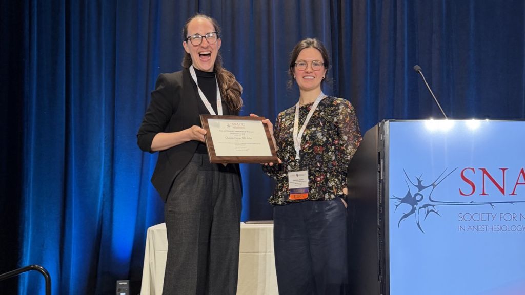 Charlotte Herber receives the Best of Science – Clinical/Translational Award at the SNACC Annual Meeting.